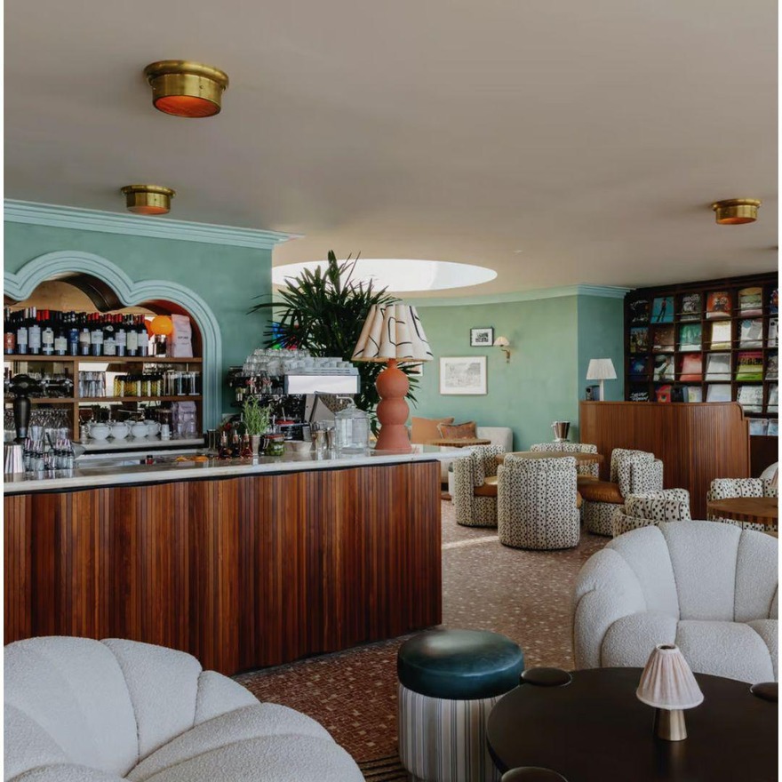 Light green Veneto Venetian plaster by Viero UK creates a refreshing yet subtle backdrop in Soho House's bar area.